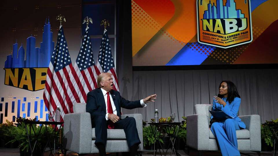 CHICAGO, ILLINOIS - JULY 31: Republican presidential candidate former President Donald Trump speaks with Rachel Scott, senior congressional correspondent for ABC News during a question and answer session at the National Association of Black Journalists (NABJ) convention at the Hilton Hotel on July 31, 2024 in Chicago, Illinois. Trump also fielded questions from Harris Faulkner, anchor of The Faulkner Focus on FOX News and Kadia Goba, politics reporter at Semafor during the event.