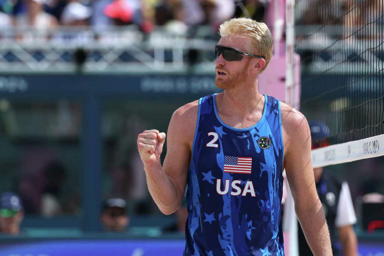 PARIS, FRANCE - AUGUST 02: Chase Budinger of Team United States reacts during a Men's Preliminary Phase match on day seven of the Olympic Games Paris 2024 at Eiffel Tower Stadium on August 02, 2024 in Paris, France.