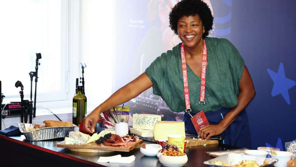 PARIS, FRANCE - JULY 2: U.S. Olympian Dawn Burrell puts on a cooking demonstration at the USA House at Paris 2024 on July 29, 2024 in Paris, France.