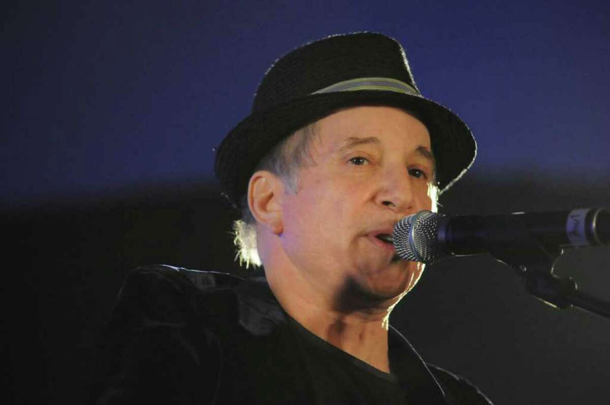 Paul Simon performs during the Multiple Myeloma Research Foundation's gala on Saturday, Oct. 30, 2010, at the Hyatt Regency Greenwich.