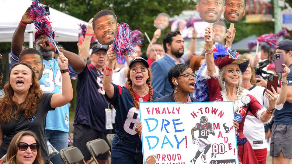 Houston Texans fans cheer on Andre Johnson during the Pro Football Hall of Fame Grand Parade on Saturday, Aug. 3, 2024 in Canton, Ohio. Johnson is the first Texans player to be inducted into the Hall of Fame.