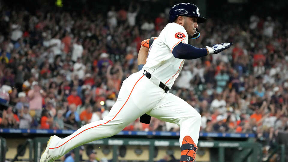 Houston Astros' Pedro Leon (4) singles, but was out at second during the third inning of an MLB baseball game at Minute Maid Park on Saturday, Aug. 3, 2024, in Houston.