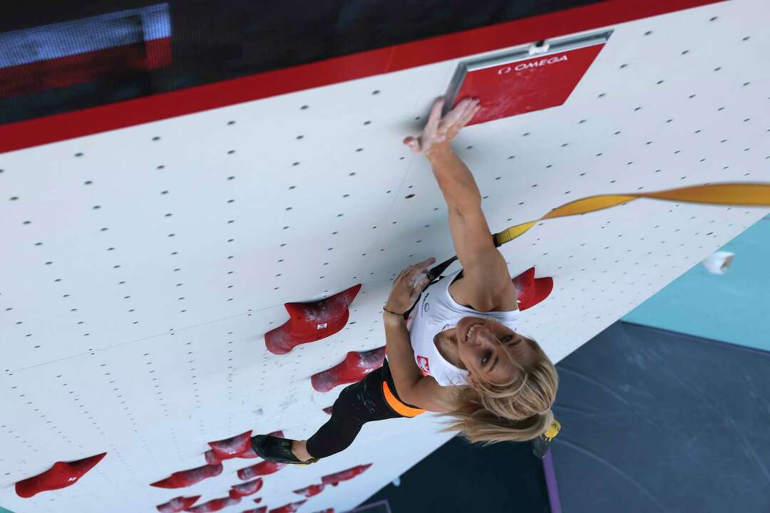 Speed sport climber Aleksandra Miroslaw wins Olympic gold 2 days after