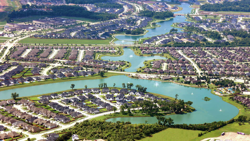 Sienna is a 10,800-acre community by Johnson Development and Toll Bros. in Missouri City south of Houston. Pictured is an aerial shot of Sienna taken in June 2024.