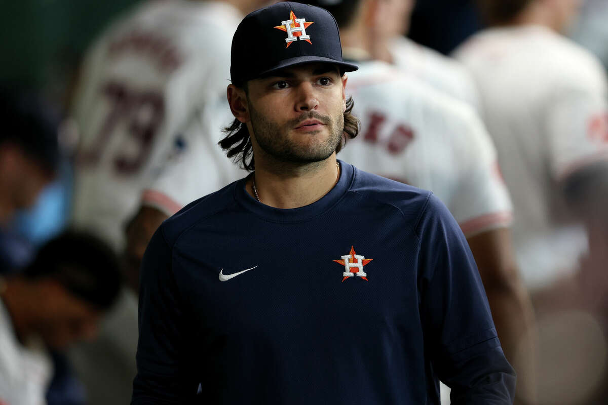 Lance McCullers Jr. #43 of the Houston Astros watches from the dugout in the seventh inning against the Texas Rangers at Minute Maid Park on April 13, 2024 in Houston, Texas.