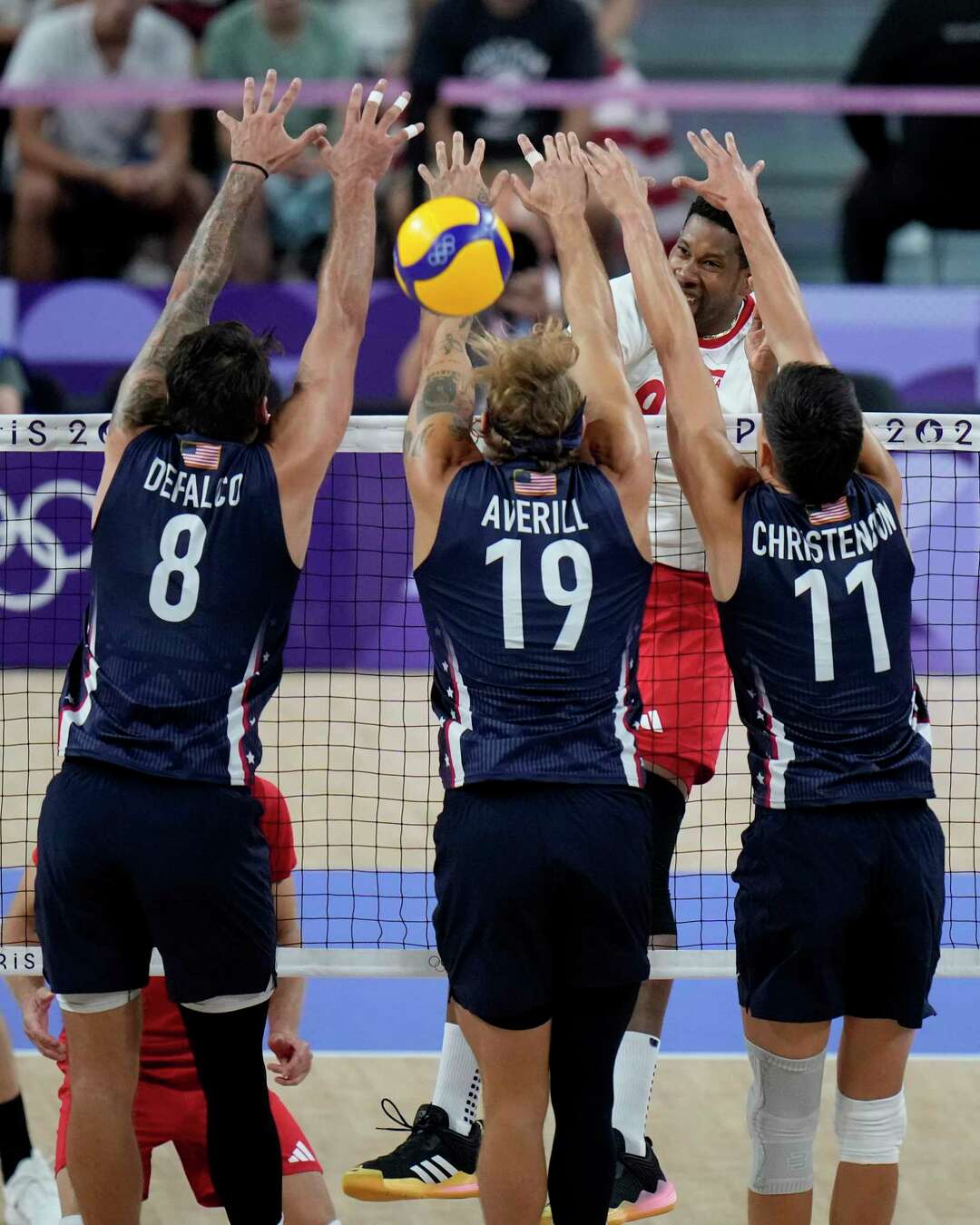 Poland rallies to beat the US in men's volleyball in fifth set and will