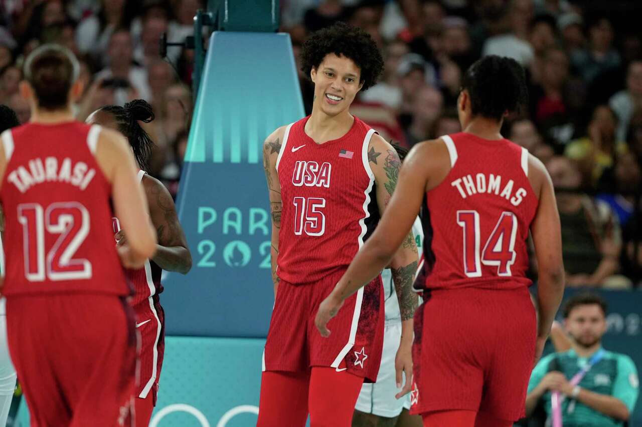 United States' Brittney Griner (15) smiles after a basket against Nigeria during a women's quarterfinal game at Bercy Arena at the 2024 Summer Olympics, Wednesday, Aug. 7, 2024, in Paris, France. (AP Photo/Mark J. Terrill)