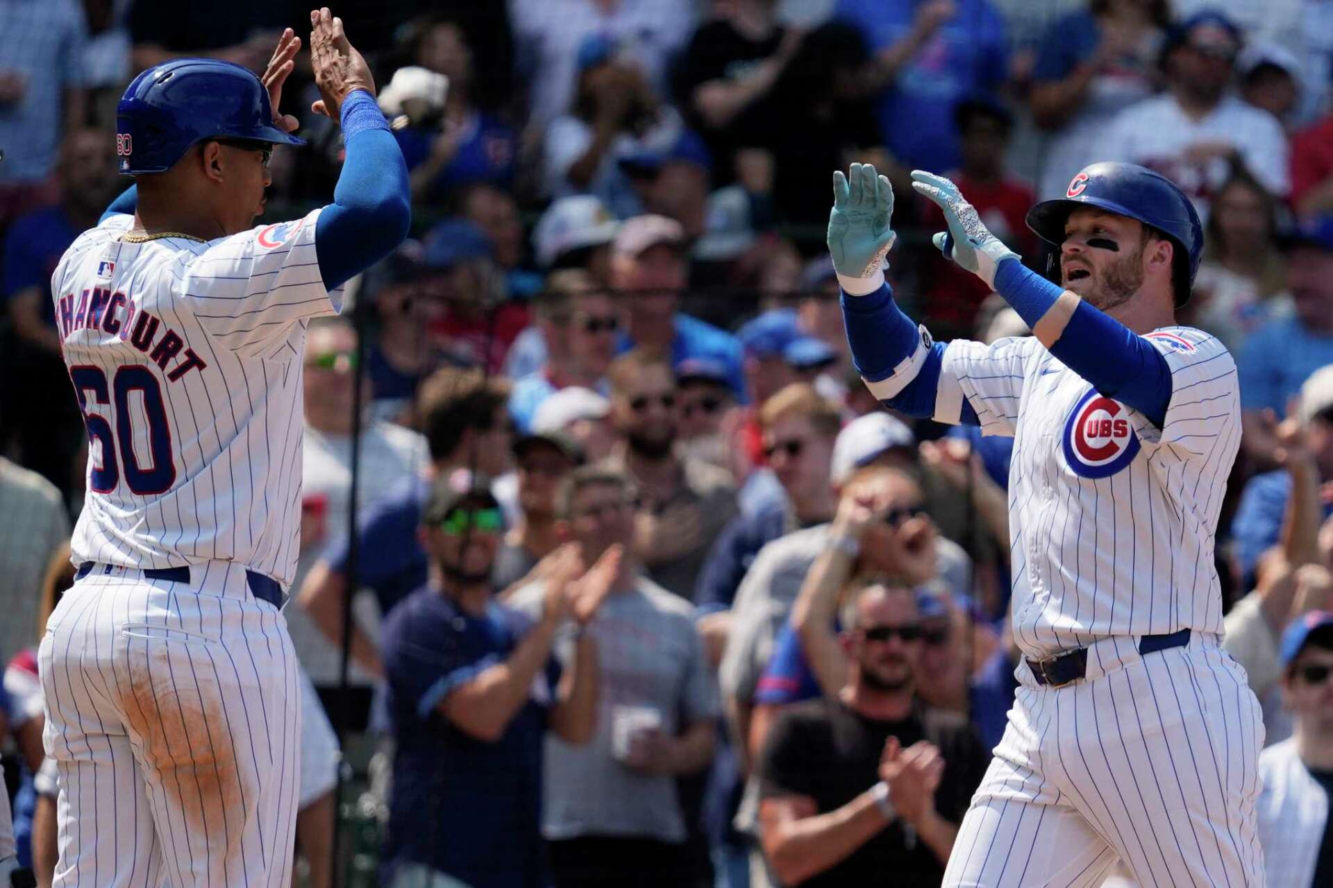 Ian Happ and Michael Busch homers power Cubs past Twins 8-2