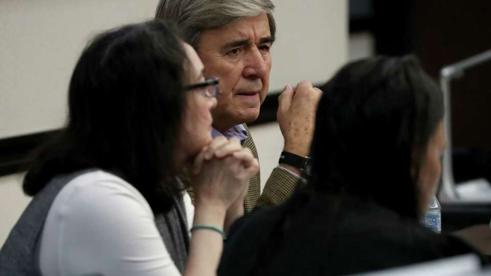 Rose Marie Kosmetatos, left, and her husband, Antonios Pagourtzis, parents of accused Santa Fe High School shooter Dimitrios Pagourtzis, wait for the start of the seventh day of the civil trial against them Thursday, Aug. 8, 2024, in Galveston County Court No. 3 Judge Jack EwingÕs courtroom at the Galveston County Courthouse in Galveston, Texas. The civil lawsuit was filed by families of seven of those killed and four of the 13 people who were wounded in the May 18, 2018 shooting at Santa Fe High School.