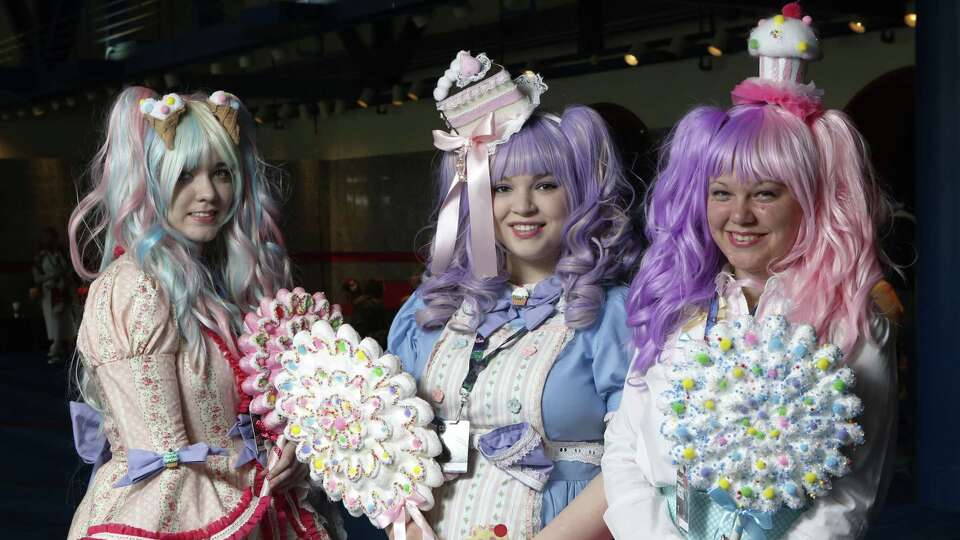 Guests pose for a photo at the Anime Matsuri convention at George R Brown Convention Center Saturday, April 4, 2015, in Houston.