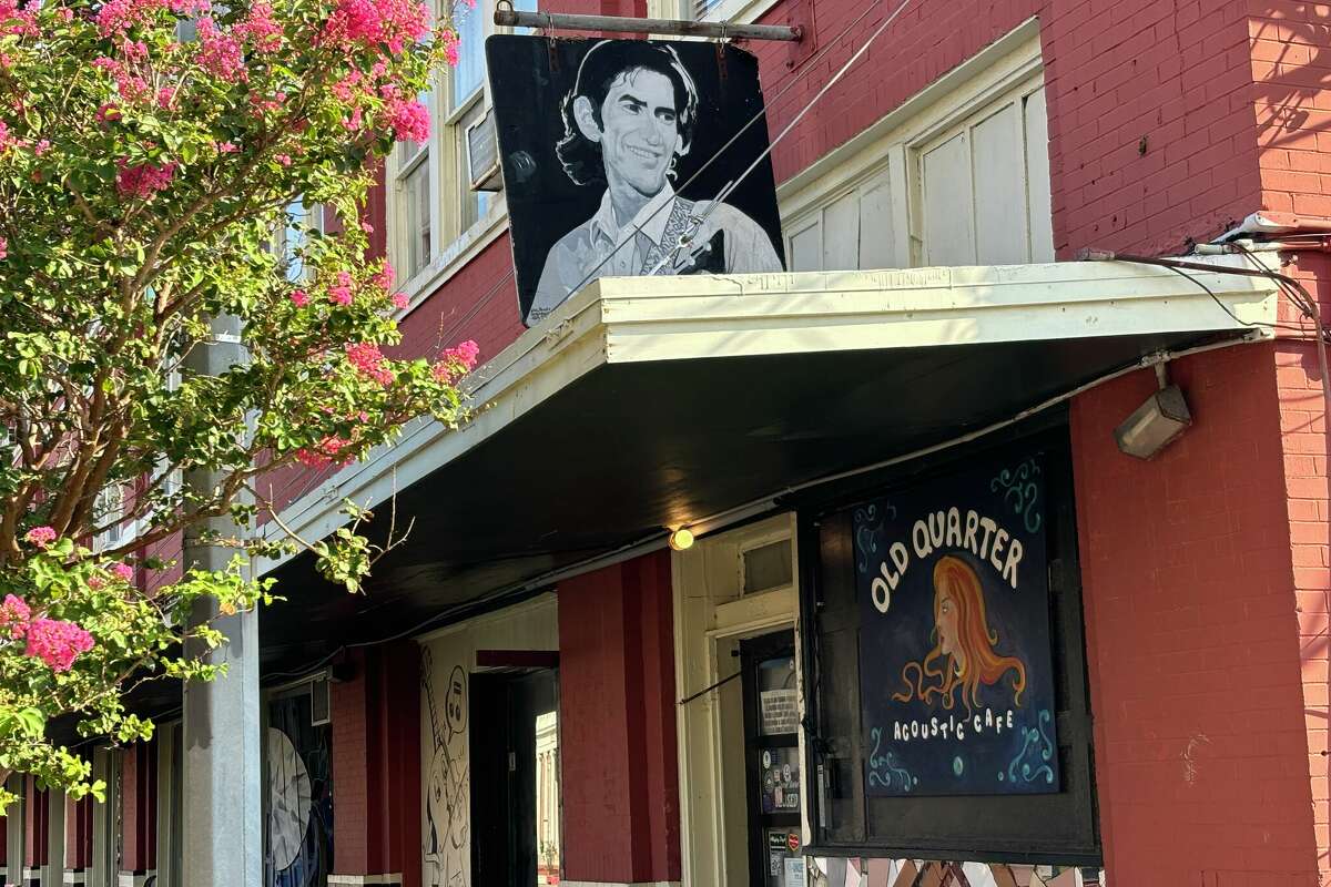 Townes Van Zandt, who recorded arguably his best album at the Houston club, watches over the Galveston Old Quarter.