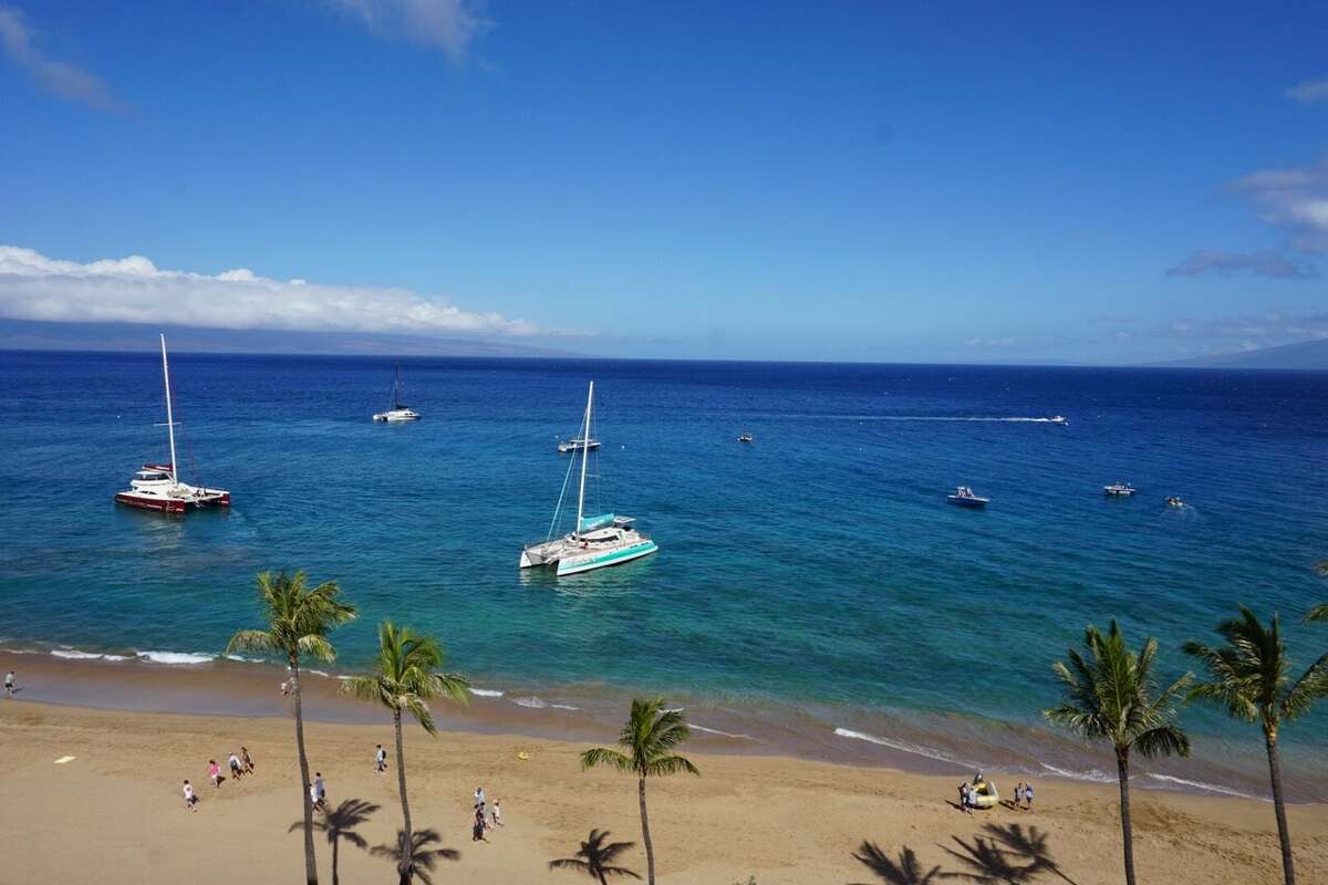 West Maui is attracting visitors to Kaanapali Beach, but travel to the island is decreasing compared to last year. 