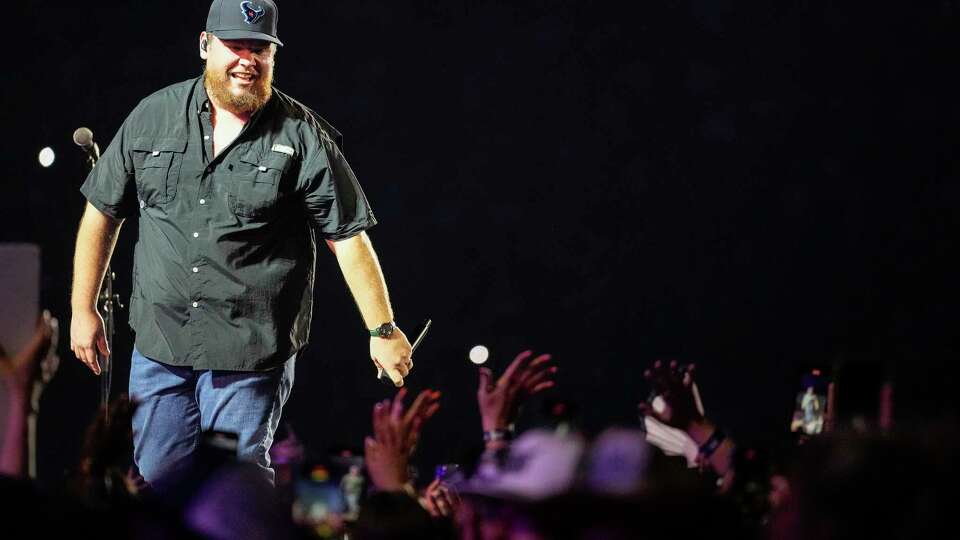 Luke Combs performs on stage at NRG Stadium on Friday, Aug. 9, 2024, in Houston.