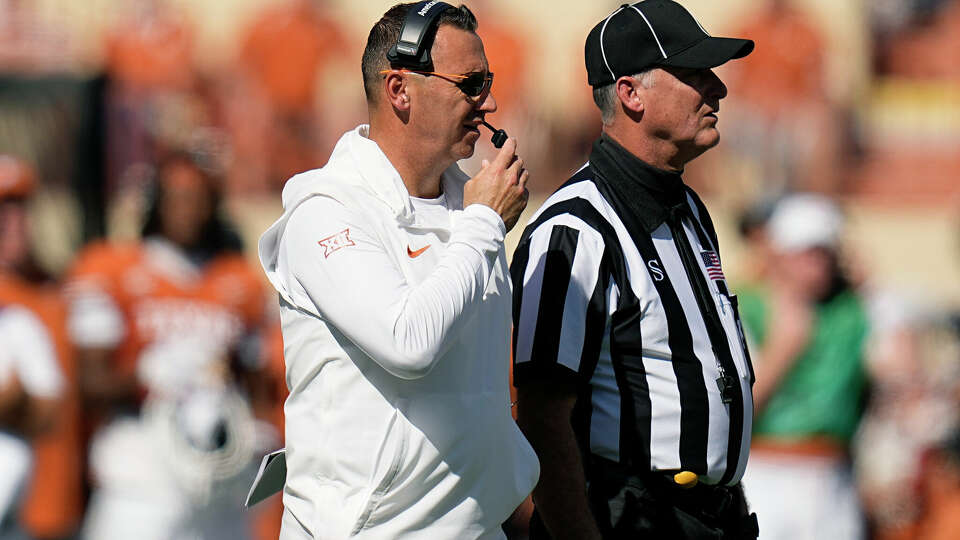 Texas Steve Sarkisian is in favor of the college game adapting many aspects from the NFL, including injury reports and communication to players on field via headsets and helmets.