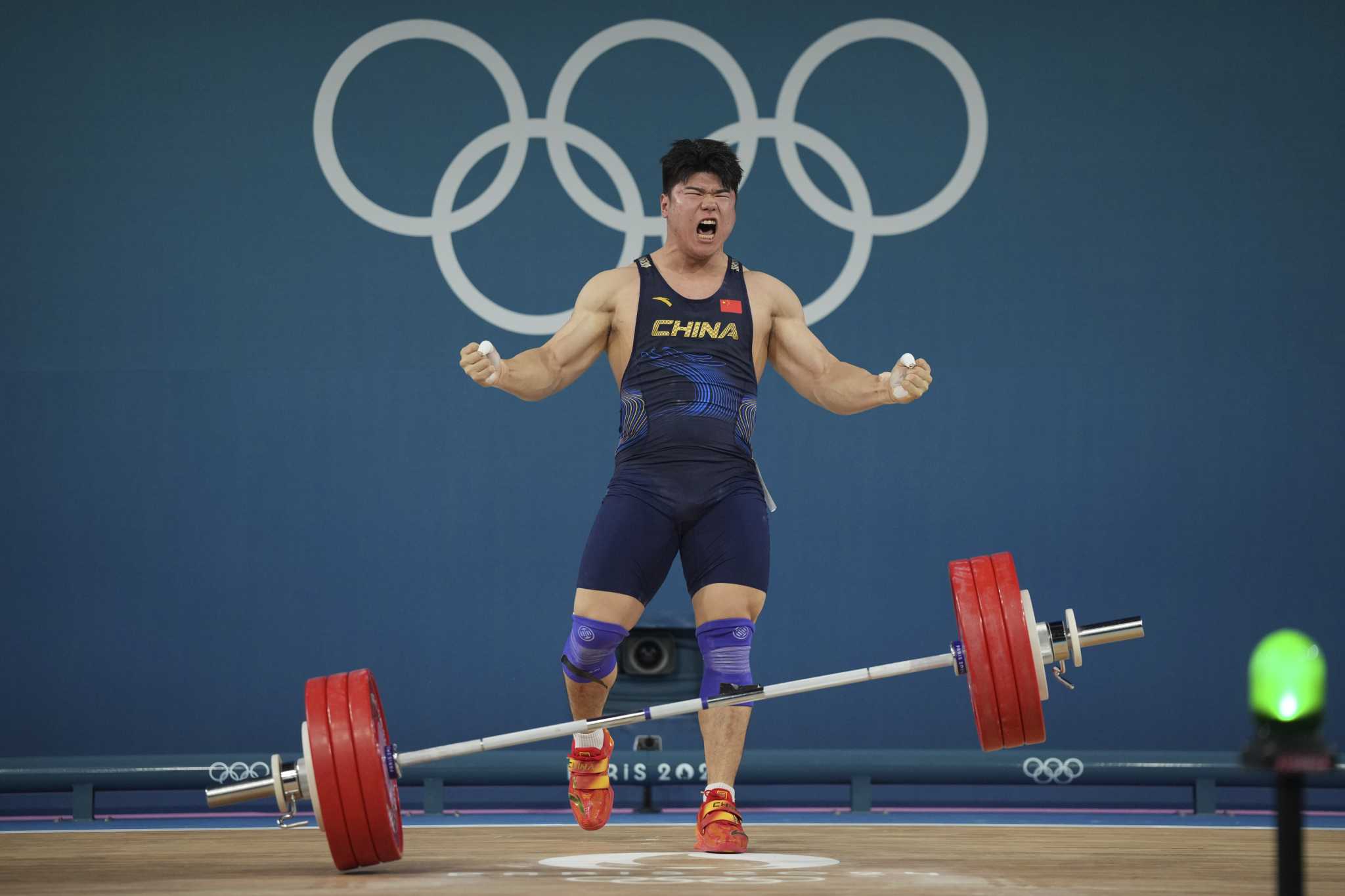 Liu Huanhua wins China's fourth weightlifting gold at the Paris Olympics