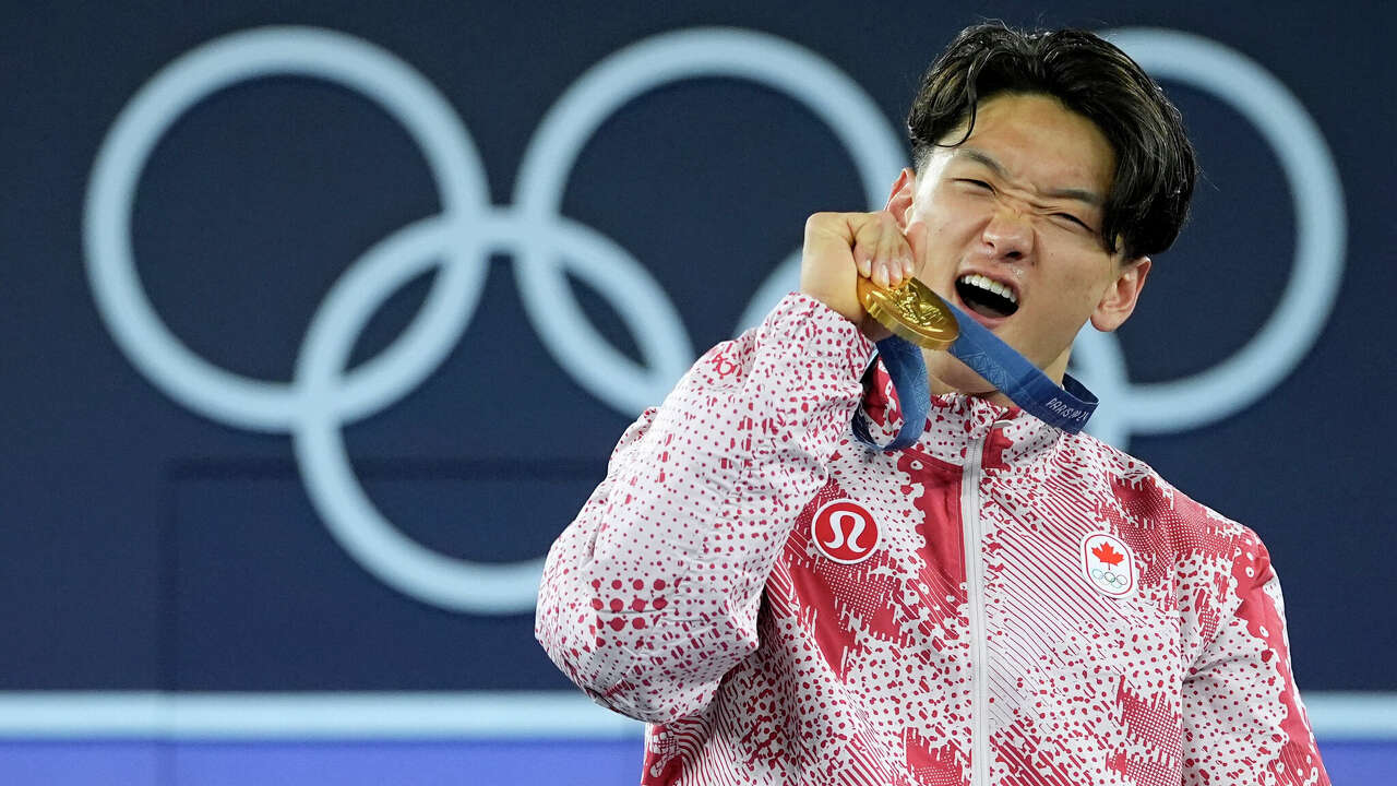 Gold medalist Canada's Philip Kim, known as B-Boy Phil Wizard, poses with his medal after the B-Boys finals in the breaking competition at La Concorde Urban Park at the 2024 Summer Olympics, Saturday, Aug. 10, 2024, in Paris, France. 