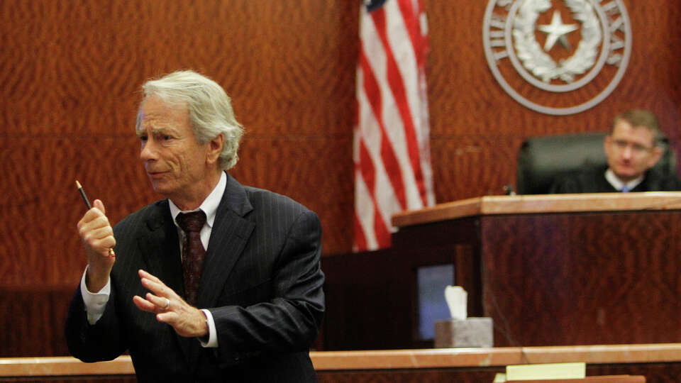 Defense Attorney Mike DeGeurin delivers opening statements at the Harris County Criminal Courthouse on Wednesday, Oct. 24, 2012, in Houston. Jessica Tata is accused in the deaths of four children at her west Houston daycare. 