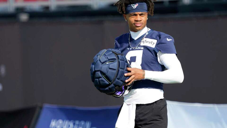 Houston Texans wide receiver Tank Dell (3) gets ready to practice during an NFL training camp Sunday, Aug. 11, 2024, in Houston.