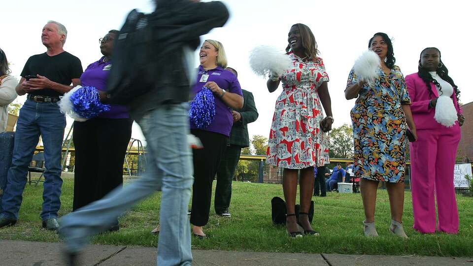 A Marshall Middle School student makes their way to the building for the first day of school on Monday, Aug. 12, 2024 in Houston.