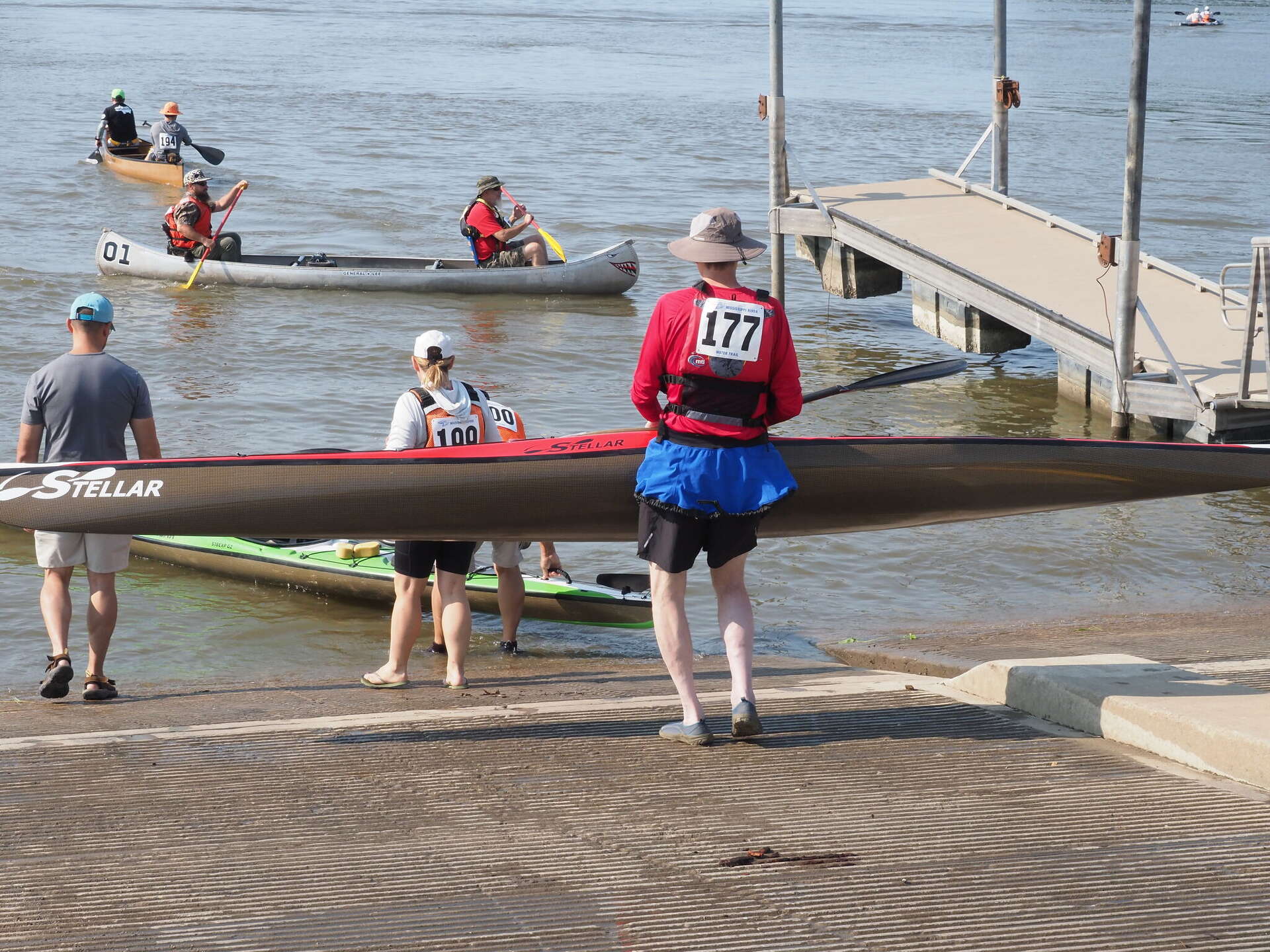 Firecracker Racer Paddlers compete in Firecracker Race on Mississippi River