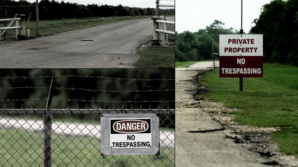 The entrance to a property owned by CenterPoint Energy is seen along South Cotton Lake Road in Beach City.