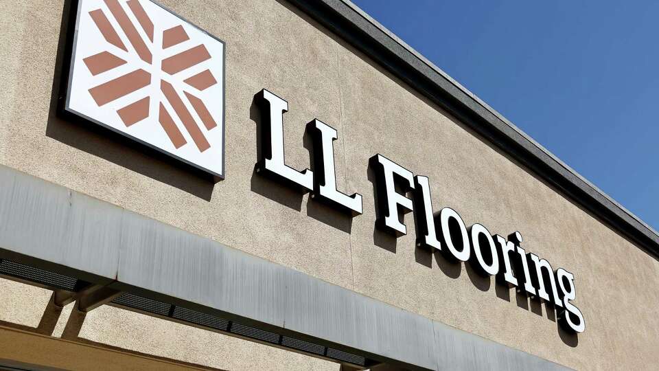 TORRANCE, CALIFORNIA - AUGUST 12: The LL Flooring logo is displayed at one of the LL Flooring retail locations which will close on August 12, 2024 in Torrance, California. The specialty flooring company, formerly called Lumber Liquidators, filed for Chapter 11 bankruptcy yesterday and is closing 94 locations across the U.S.