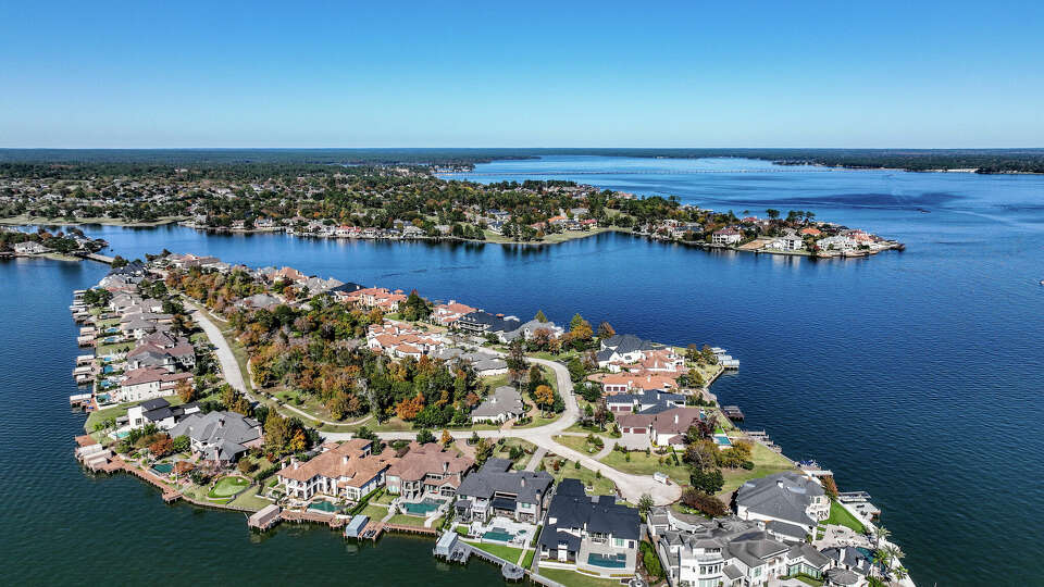 A photo shows Bentwater's Benthaven Island on Lake Conroe. The island is accessible by bridge and has approximately 40 to 50 homes on the island. 