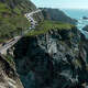 A convoy of vehicles are led through a closed section of Highway. 1 on Tuesday, April 2, 2024 in Big Sur, CA. A biker fell 100 feet down a rockslide off a section of Highway 1 near Big Sur on Friday and had to be rescued and airlifted to a hospital.