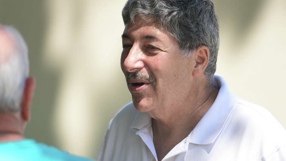 Greenwich's Michael Goldstein, a Republican candidate for the 4th Congressional District U.S. House seat, chats with voters outside the Republican primary election at Central Middle School, the District 8 polling center, in Greenwich, Conn. Aug. 13, 2024. Greenwich's Michael Goldstein and Fairfield's Bob MacGuffie were on the ballot, with the winner to face incumbent Democrat Jim Himes in November.