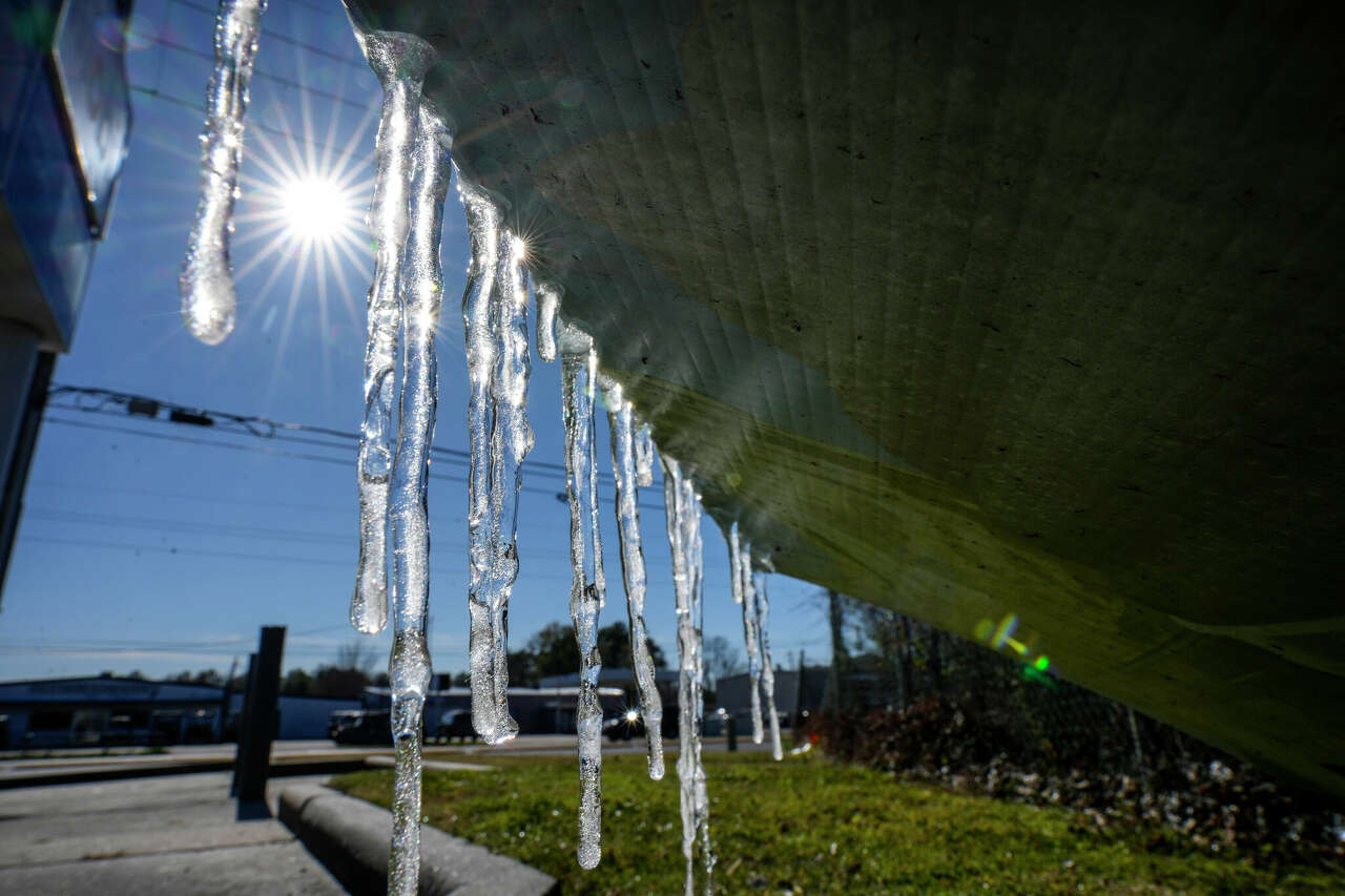 Icicles are formed on a sign at a convenience store along FM 2920 on Jan. 16 in Spring. 