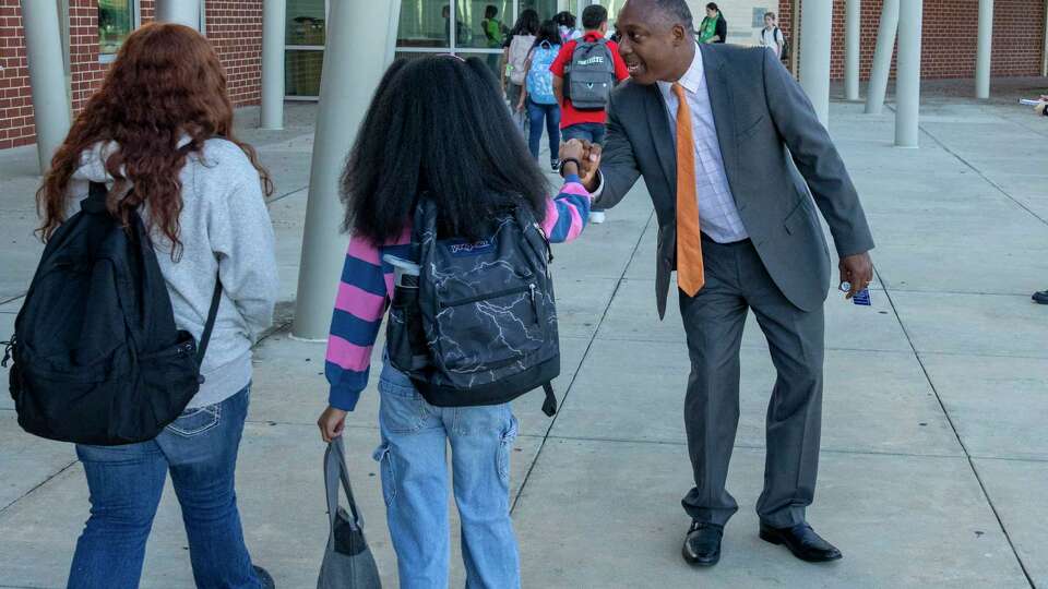 La Porte ISD Superintendent of Schools Dr. Walter G. Jackson, Ed.D. gets a fist bump from a student on the first day of school Wednesday, Aug. 14, 2024 at Bayshore Elementary School in La Porte.