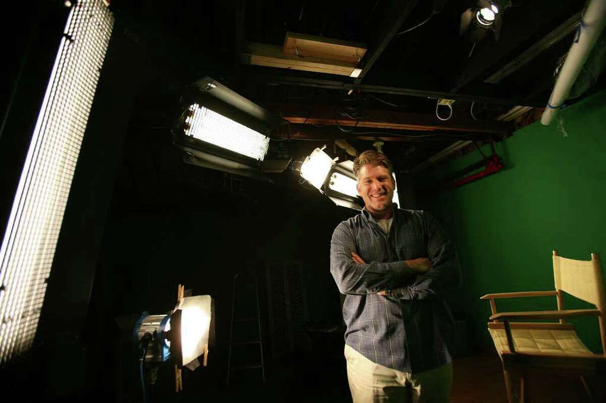 J. Sibley Law, owner of the new media company Saxon Mills, LLC in Stratford, in his home studio where he produces media content for the World Wide Web.