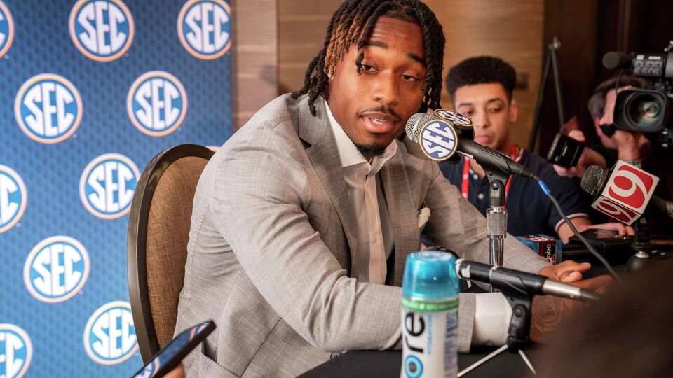 Texas defensive back Jahdae Barron speaks during the Southeastern Conference NCAA college football media days Wednesday, July 17, 2024, in Dallas. (AP Photo/Jeffrey McWhorter)