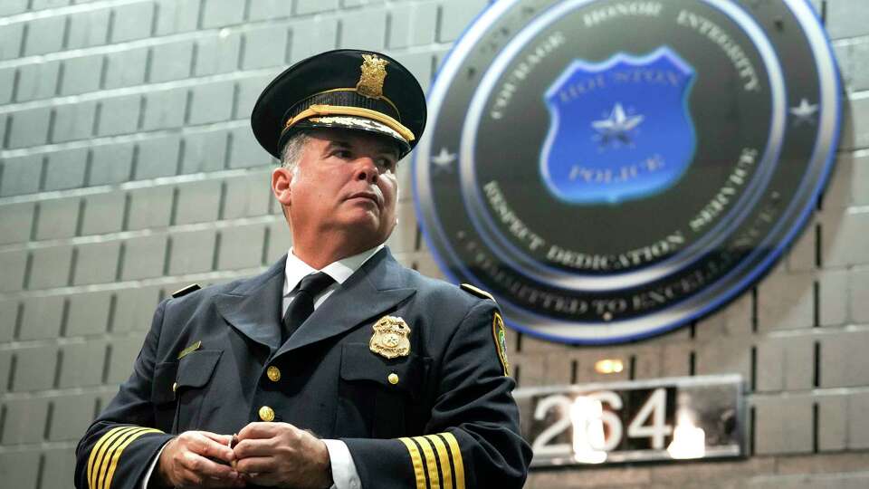 Houston Police Chief Noe Diaz waits to pin badges on new police officers during the graduation ceremony for Houston Police Academy Cadet Class 264 on Thursday, Aug. 15, 2024 in Houston. HPD welcomed 53 new officers to the force during the graduation.