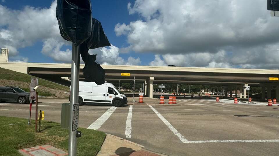 Pedestrain crossing poles are covered and sidewalks are closed on South Highway 99 on Friday, Aug. 16, 2024 in Katy.