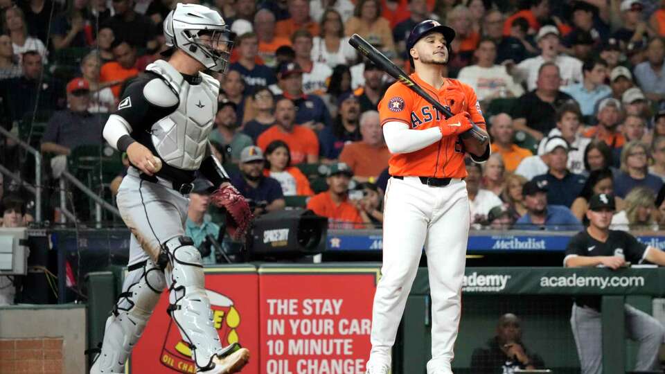 Houston Astros Yainer Diaz (21) reacts after striking out during the seventh inning of an MLB baseball game at Minute Maid Park on Friday, Aug. 16, 2024, in Houston.