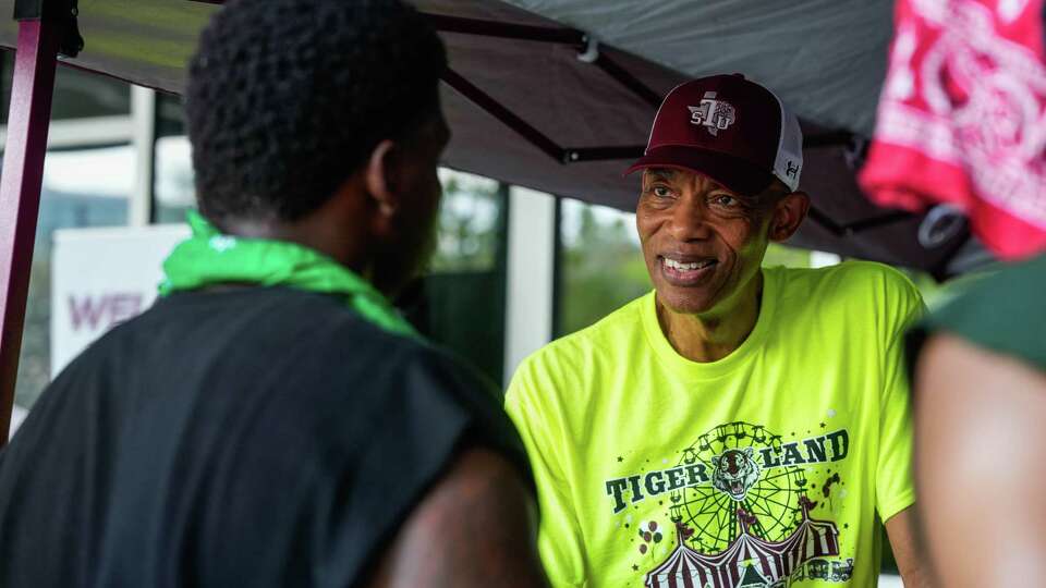 Texas Southern University President James Crawford greets students during on-campus move-in on Sunday, Aug. 18, 2024 in Houston.