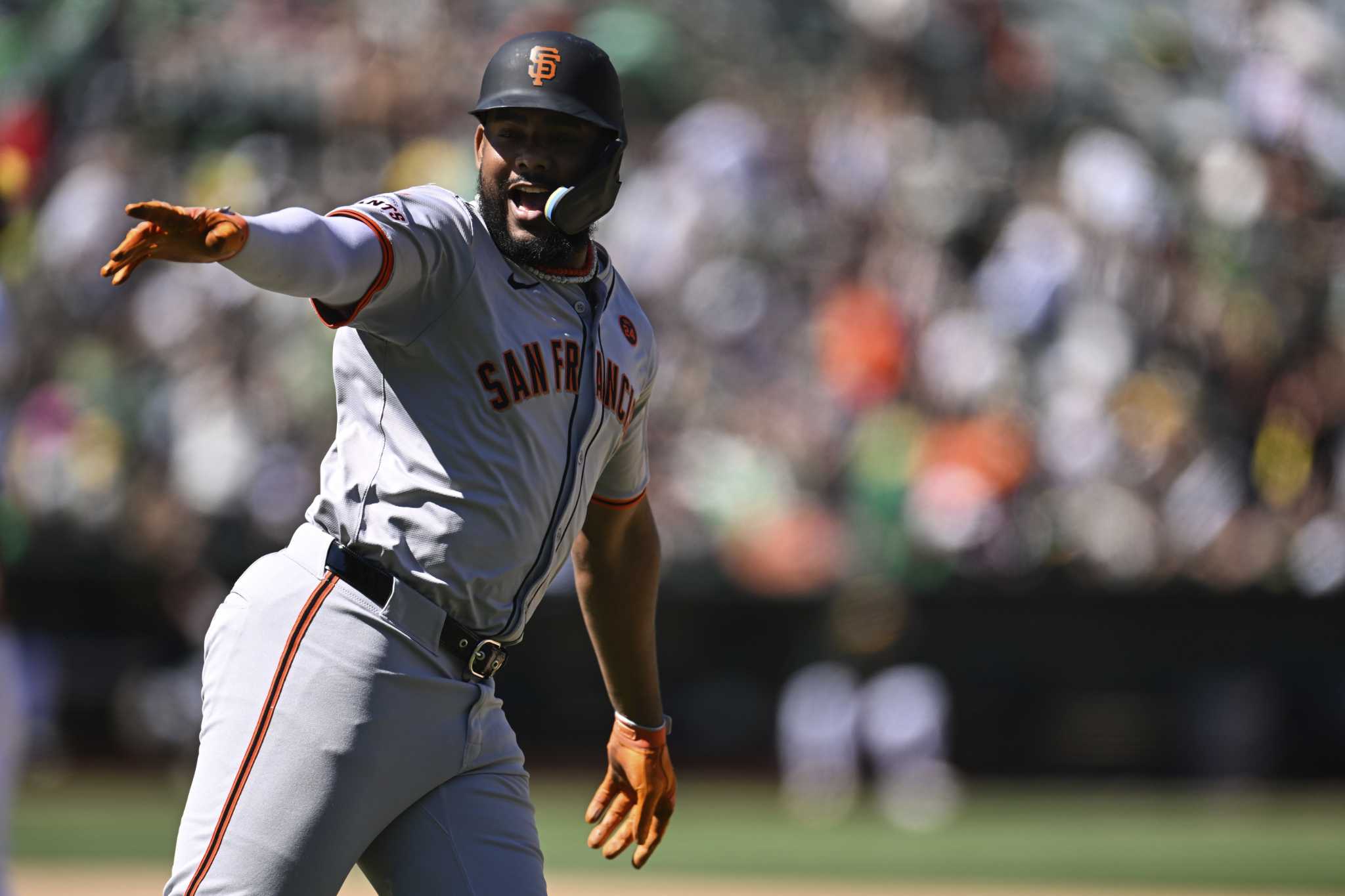 Giants homer twice in the 10th to beat A's 42 in Bay Bridge Series finale