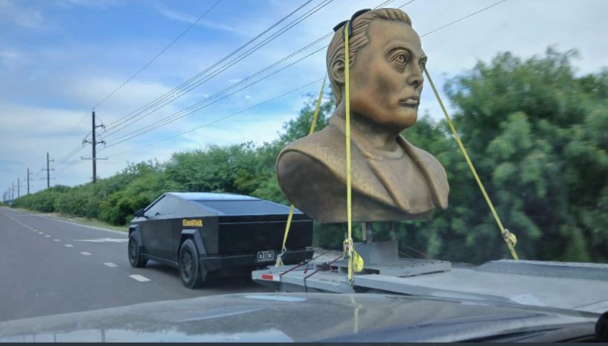 Giant Elon Musk bust raises questions as it's towed across South Texas