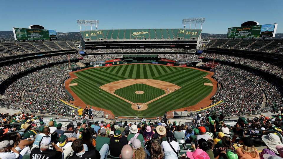 OAKLAND, CALIFORNIA - AUGUST 18: A general view of play between the Oakland Athletics and the San Francisco Giants at Oakland Coliseum on August 18, 2024 in Oakland, California.