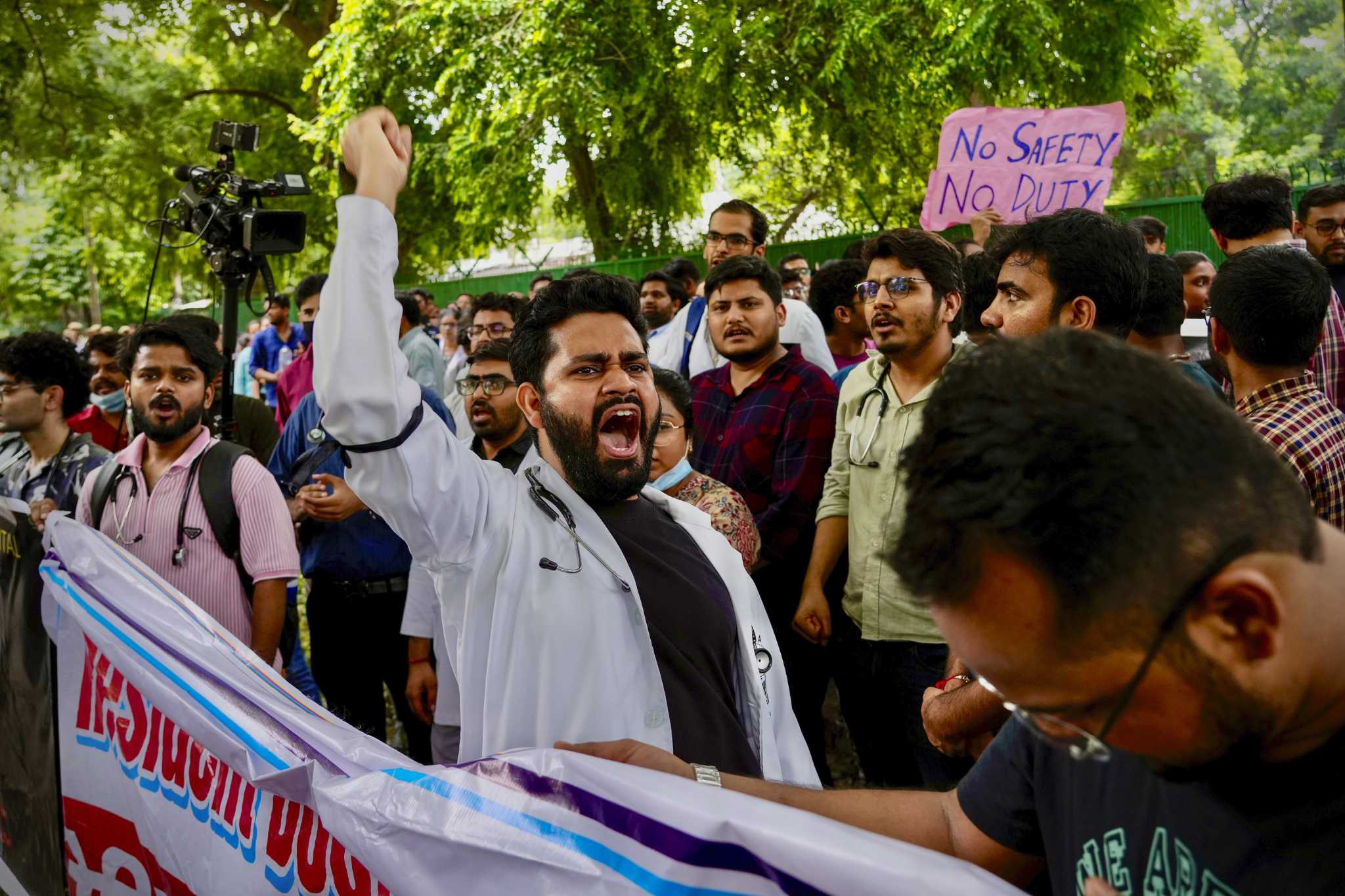 Indian doctors demand stricter laws after a colleague was raped and killed in a hospital