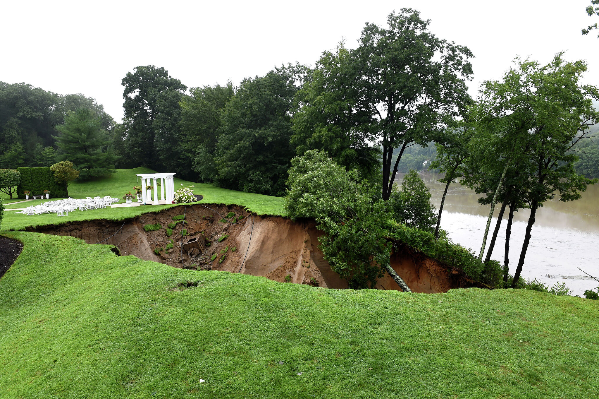 Sinkhole formed at Monroe wedding venue as floodwaters destroyed roads