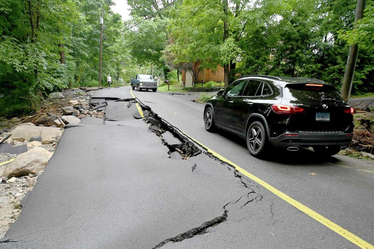 Flooding in CT prompts warnings from officials that fixing roads will be 'a long recovery'