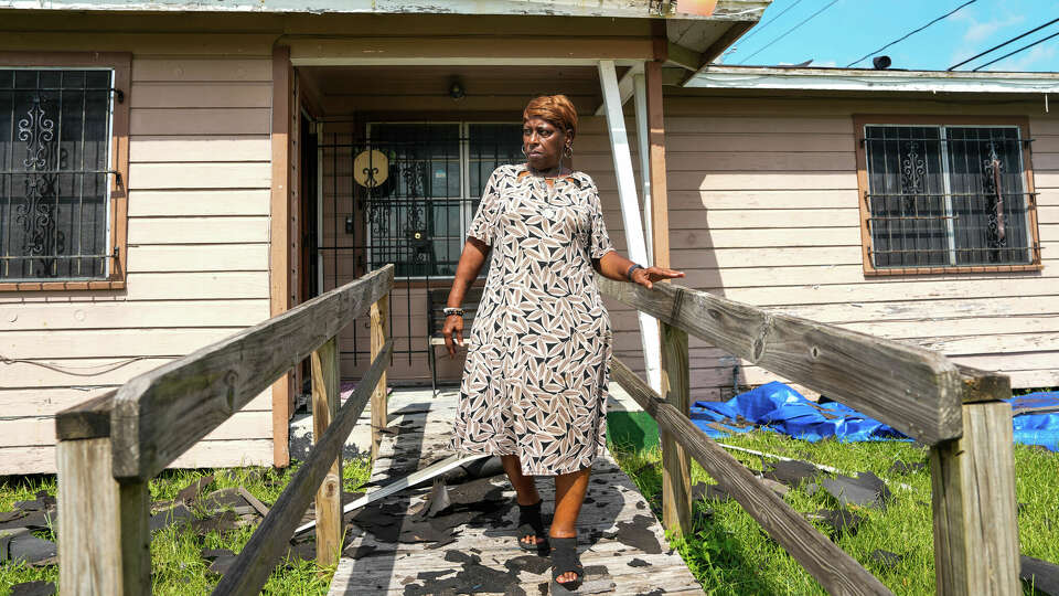 Months after the damaging storms, Derecho and Beryl, the home of Deborah Powell, 72, is still under repair from major water and wind damage, she is photographed outside of her home on Sunday, Aug. 11, 2024 in Houston.