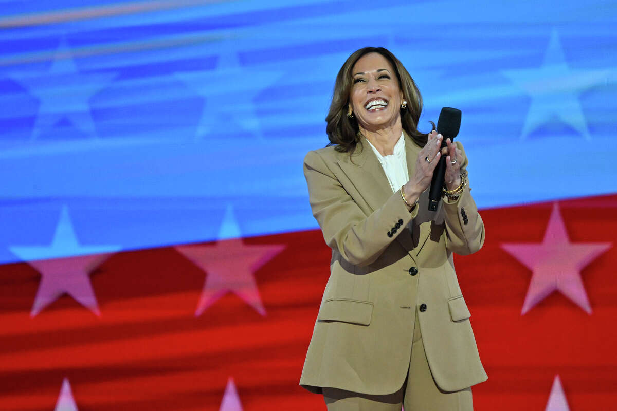 Democratic presidential nominee Vice President Kamala Harris walks on stage during the first day of the Democratic National Convention on August 19, 2024, at the United Center in Chicago, Illinois.