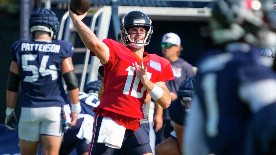 Houston Texans quarterback Davis Mills (10) throws a pass during an NFL training camp Wednesday, Aug. 21, 2024, in Houston.