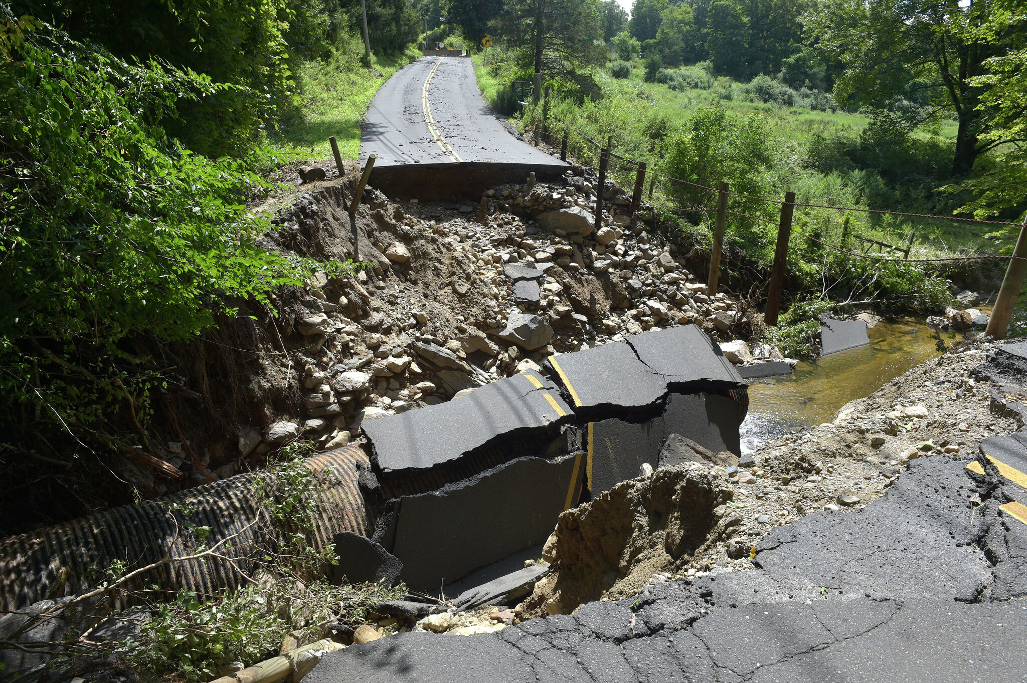 Governor: Kettletown Road in Southbury, hit hard by flooding, reopens