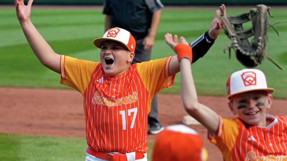 Boerne, Texas' Cooper Hastings (17) celebrates with teammates after getting the final out of a baseball game against Henderson, Nev., at the Little League World Series in South Williamsport, Pa., Wednesday, Aug. 21, 2024. (AP Photo/Gene J. Puskar)