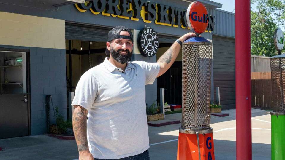 Owner Corey Scopel stands outside Corey’s Kitchen at the Fillin Station Wednesday, Aug. 21, 2024, in Alvin that offers a variety of traditional southern dishes such as chicken fried steak and chicken spaghetti as well as appetizers, specialty salads, burgers, sandwiches and frozen yogurt deserts.