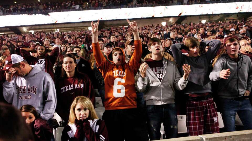 Cody Anderson cheers as the Longhorns close into field goal range during the second half of the Texas A&M Aggies vs University of Texas Longhorns rivalry NCAA football game at Kyle Field on Thanksgiving Day, Thursday, November 24, 2011 in College Station, Texas. The Longhorns won 27-25. (Patrick T. Fallon/The Dallas Morning News)